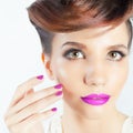 Beautiful Fashion Girl Face with Fancy Hairstyle, Colorful Nail Polish Royalty Free Stock Photo