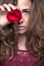 Beautiful fashion girl with red rose