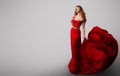 Beautiful Fashion Model Girl in Red Dress, Woman Beauty Portrait, Lady in Long Sexy Gown Royalty Free Stock Photo