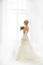 Beautiful fashion model. Sensual bride. Woman with wedding dress Royalty Free Stock Photo