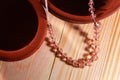 Beautiful beads necklace with clay pots Royalty Free Stock Photo