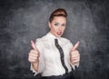 Beautiful fashion woman showing thumbs up sign