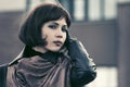 Beautiful fashion woman walking on city street Royalty Free Stock Photo