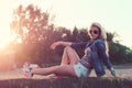 Beautiful fashion young woman sunglasses sitting Royalty Free Stock Photo