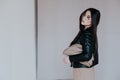 Beautiful fashionable eastern brunette woman in black leather jacket Royalty Free Stock Photo