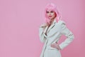 Beautiful fashionable girl attractive look white blazer pink wig studio model unaltered Royalty Free Stock Photo