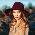 Beautiful fashionable woman wearing red hat Royalty Free Stock Photo