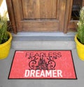 Beautiful Fearless Dreamer Printed Kids Woolen Welcome Entry Doormat outside home with yellow flowers and leaves