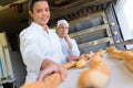 beautiful female bakery with various types breads Royalty Free Stock Photo