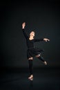 Beautiful Female Ballet Dancer dancing on Black Background Royalty Free Stock Photo
