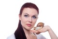 Beautiful female doctor cosmetologist with Akhatina snail in her hands offers collagen mask, snail mucus, skin rejuvenation Royalty Free Stock Photo
