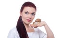 Beautiful female doctor cosmetologist with Akhatina snail in her hands offers collagen mask, snail mucus, skin rejuvenation Royalty Free Stock Photo