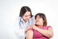 Beautiful female doctor Cure ailments of obese women patients Asians seated on a wheelchair.