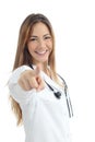 Beautiful female doctor pointing at camera