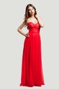 Beautiful female fashion model in red dress Royalty Free Stock Photo