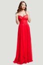 Beautiful female fashion model in red dress Royalty Free Stock Photo