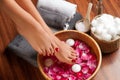 Beautiful female feet at spa salon on pedicure procedure. Royalty Free Stock Photo