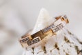 Beautiful female gold ring adorned with small diamonds