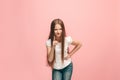 Beautiful female half-length portrait on pink studio backgroud. The young emotional teen girl Royalty Free Stock Photo