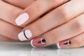 Beautiful female hands with a fashionable manicure. Geometric design of nails Royalty Free Stock Photo