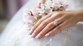 Hands of the bride with wedding nail design