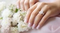 Hands of the bride with wedding nail design