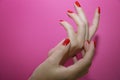 Beautiful female hands with red manicure and nail isolated Royalty Free Stock Photo