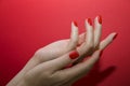 Beautiful female hands with red manicure and nail isolated Royalty Free Stock Photo