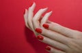 Beautiful female hands with red manicure and nail isolated Royalty Free Stock Photo