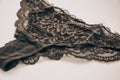 Beautiful female lacy black panties isolated on white background Royalty Free Stock Photo