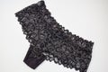 Beautiful female lacy black panties isolated on white background Royalty Free Stock Photo