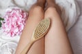 Beautiful female legs with body brush Royalty Free Stock Photo