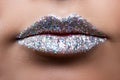 Beautiful female lips closeup. Lips in sequins. Metal sequins.