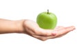 Beautiful female manicured hand holding a perfect green apple with water drops isolated Royalty Free Stock Photo