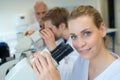 beautiful female medical doctor using microscope Royalty Free Stock Photo