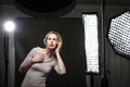 Beautiful female model posing in a photographic studio