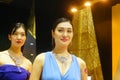 Beautiful female models show gold jewelry at the Shenzhen International Jewelry Show