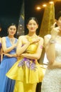 Beautiful female models show gold jewelry at the Shenzhen International Jewelry Show