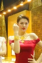 Beautiful female models show gold jewelry at the Shenzhen International Jewelry Show