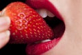 Beautiful Female Mouth Eating A Strawberry