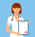 Beautiful female nurse is holding clipboard and showing document. Portrait of young nurse or medic with clipboard and stethoscope Royalty Free Stock Photo