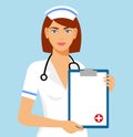 Beautiful female nurse is holding clipboard and showing document. Portrait of young nurse or medic with clipboard and stethoscope Royalty Free Stock Photo