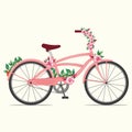 Pink bicycle with rose flowers Royalty Free Stock Photo