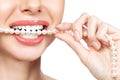 Beautiful female smile and pearl necklace, Dental Health Concept