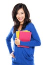 Beautiful female student holding notebooks Royalty Free Stock Photo
