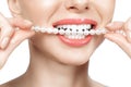 Beautiful female teeth smile and pearl necklace, Dental Health Concept Teeth whitening. Dental clinic patient. Image