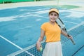 Beautiful female tennis player smiling at the camera Royalty Free Stock Photo