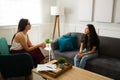 Teen girl talking to her psychologist Royalty Free Stock Photo