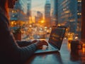 Beautiful Female Using Laptop Computer, beautiful view of the evening city in the background Royalty Free Stock Photo