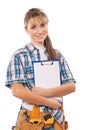 Beautiful female worker with toolbelt holding Royalty Free Stock Photo